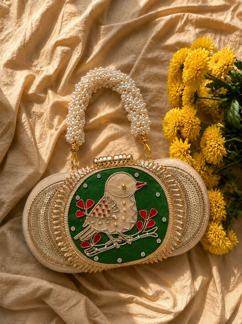 Green Bagh-e-Bulbul embroidered clutch with pearl gajra handle, wedding evening bag