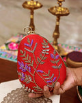 Red fern embroidered egg clutch with gold bangle handle, wedding evening bag