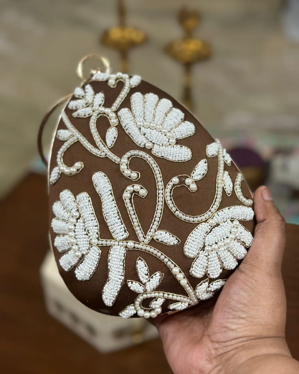 Brown pearl beaded floral egg clutch with gold bangle handle, wedding evening bag