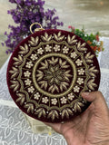 Maroon velvet round box clutch with gold zardozi and pearl mandala