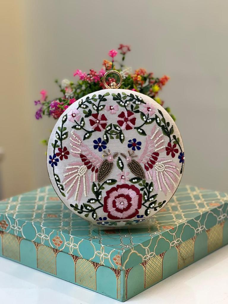 Ivory silk round box clutch with pink bird and floral hand embroidery