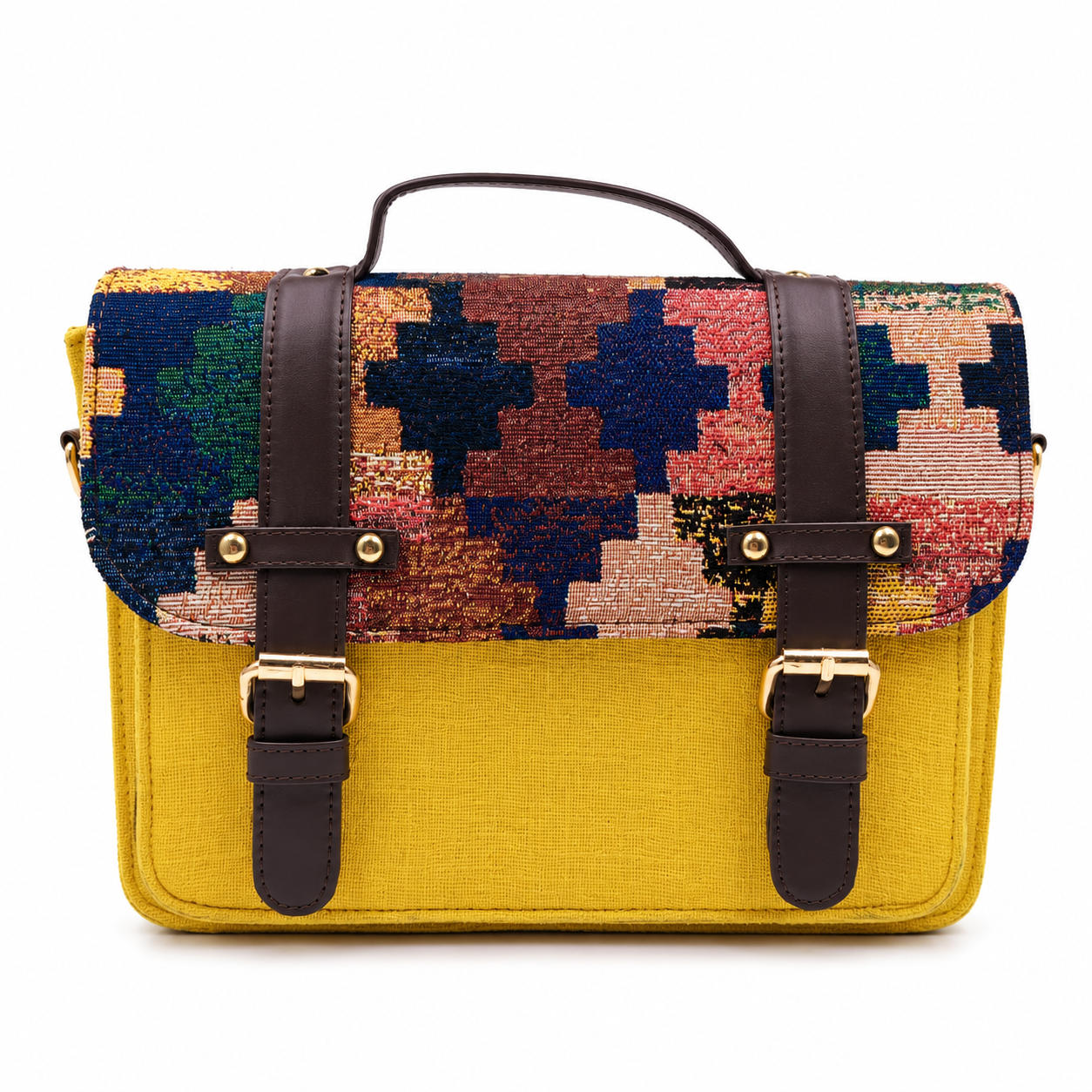 Mustard yellow mini satchel with a multicolour handwoven kilim flap, gold buckles and top handle, on a white background