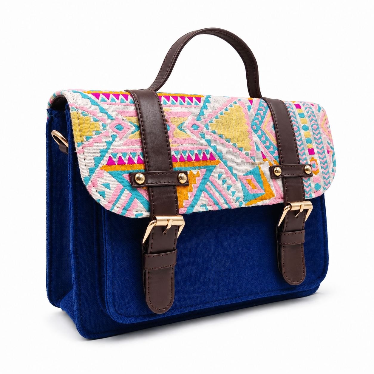 Cobalt blue mini satchel with a pastel handwoven aztec flap, gold buckles and top handle, on a white background