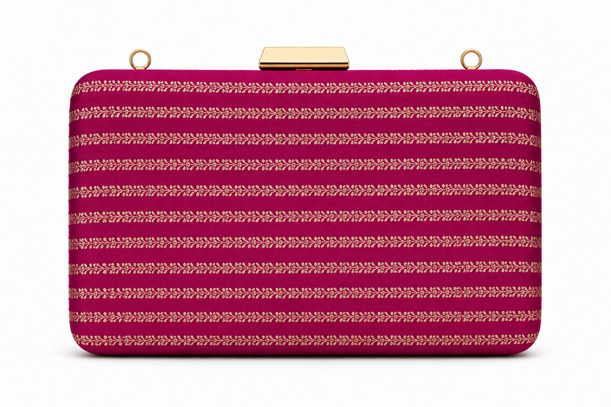Amrita magenta Banarasi silk box clutch with fine gold vine stripe weaving
