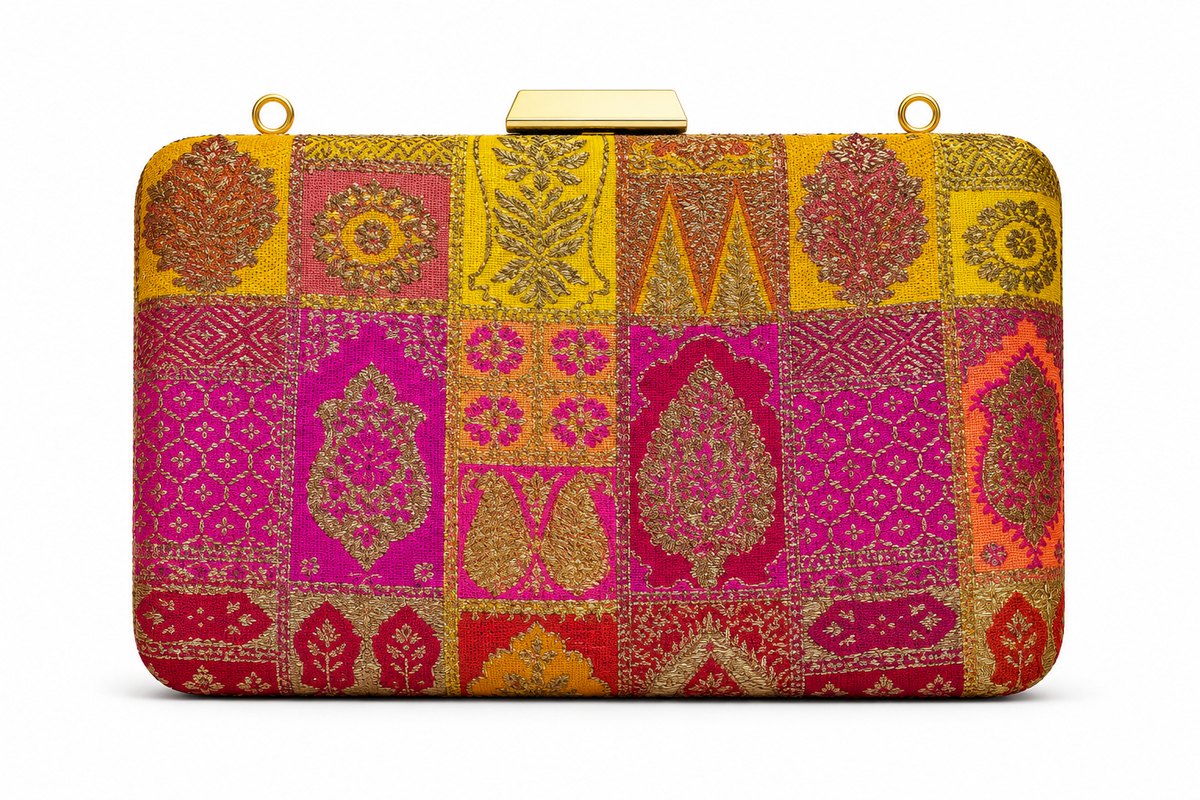 Ketaki Banarasi patchwork box clutch in marigold yellow, fuchsia and coral with gold zari